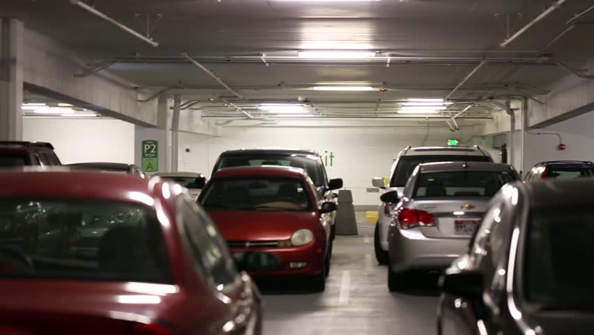 Cars Driving In A Busy Parking Garage In A City Mall Stock Footage ...