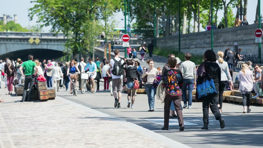 PARIS, FRANCE - MAY 17, 2014: People Walking Along The Seine At Daytime ...