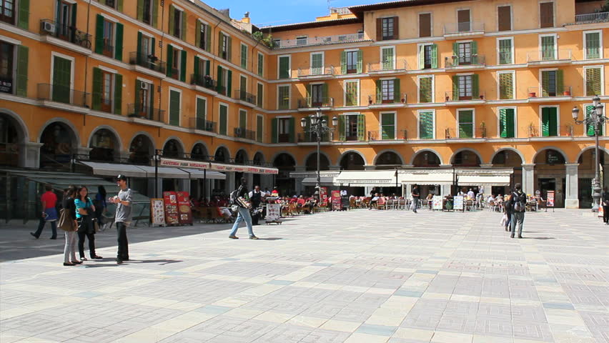 PALMA, SPAIN - CIRCA 2013: Tourists Visiting Plaza Mayor, Palma De
