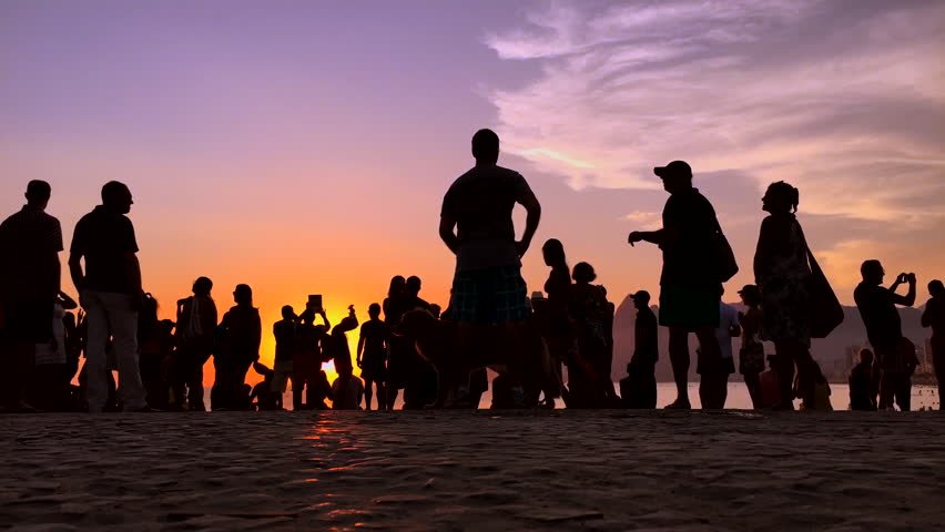 Time Lapse Of Sunset Crowd Silhouettes At The Famous Arpoador Beach Rio ...