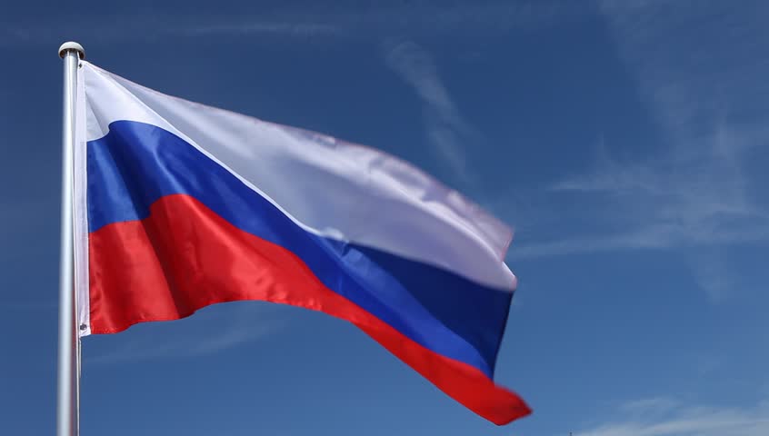 Russian National Flag Waving On Flagpole On Blue Sky Background Stock ...