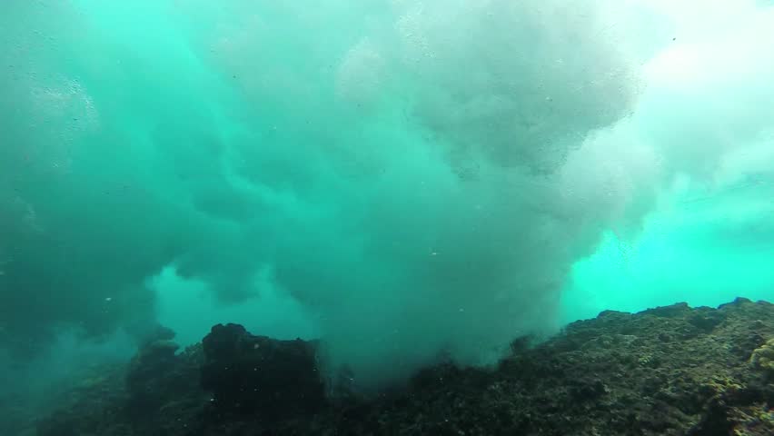 Surfing Wave Breaking Over Coral Reef, Slow Motion Underwater View ...